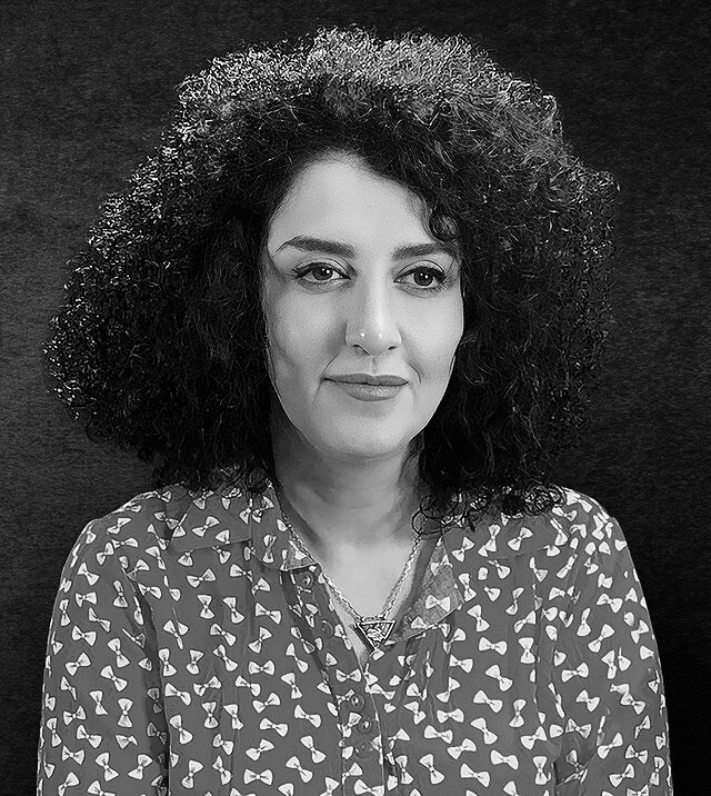 Black-and-white portrait of Narges Mohammadi