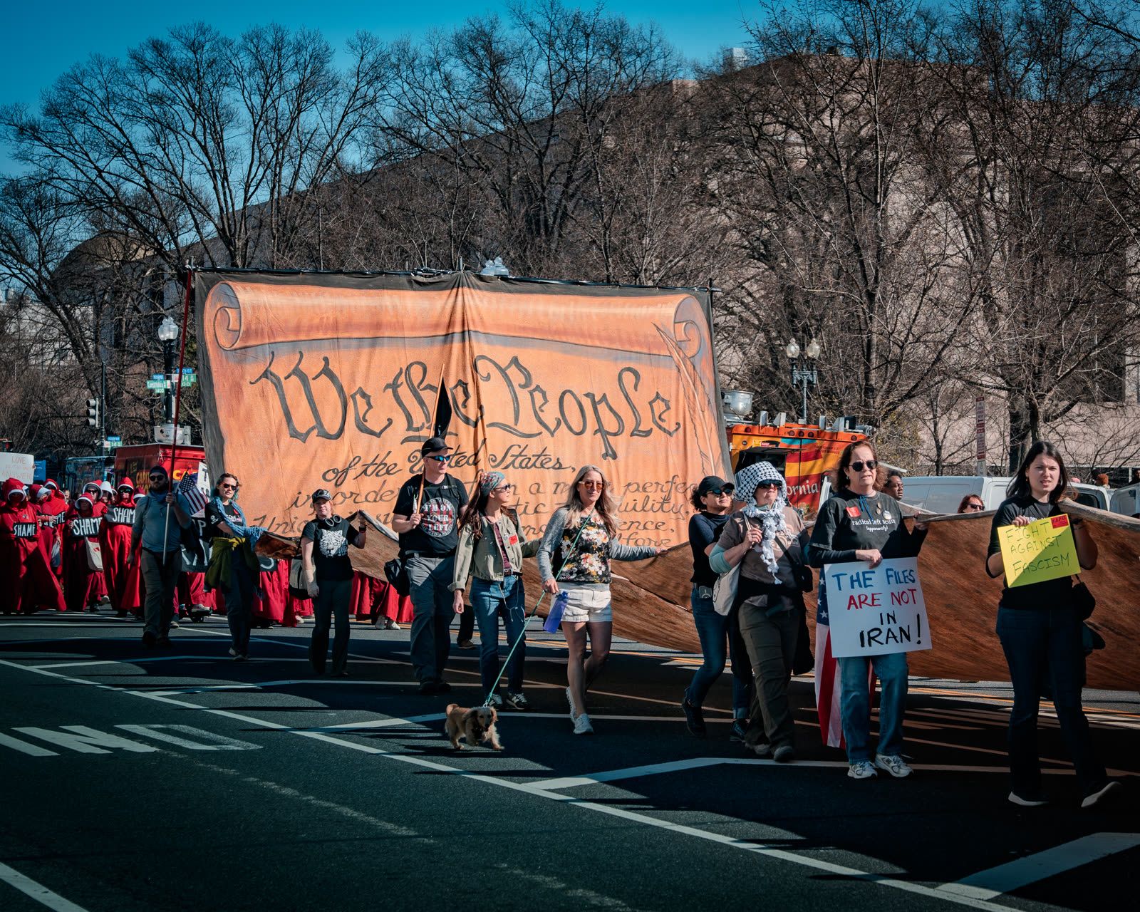 Iranian flags and Woman Life Freedom signs at a Washington DC rally in 2022.