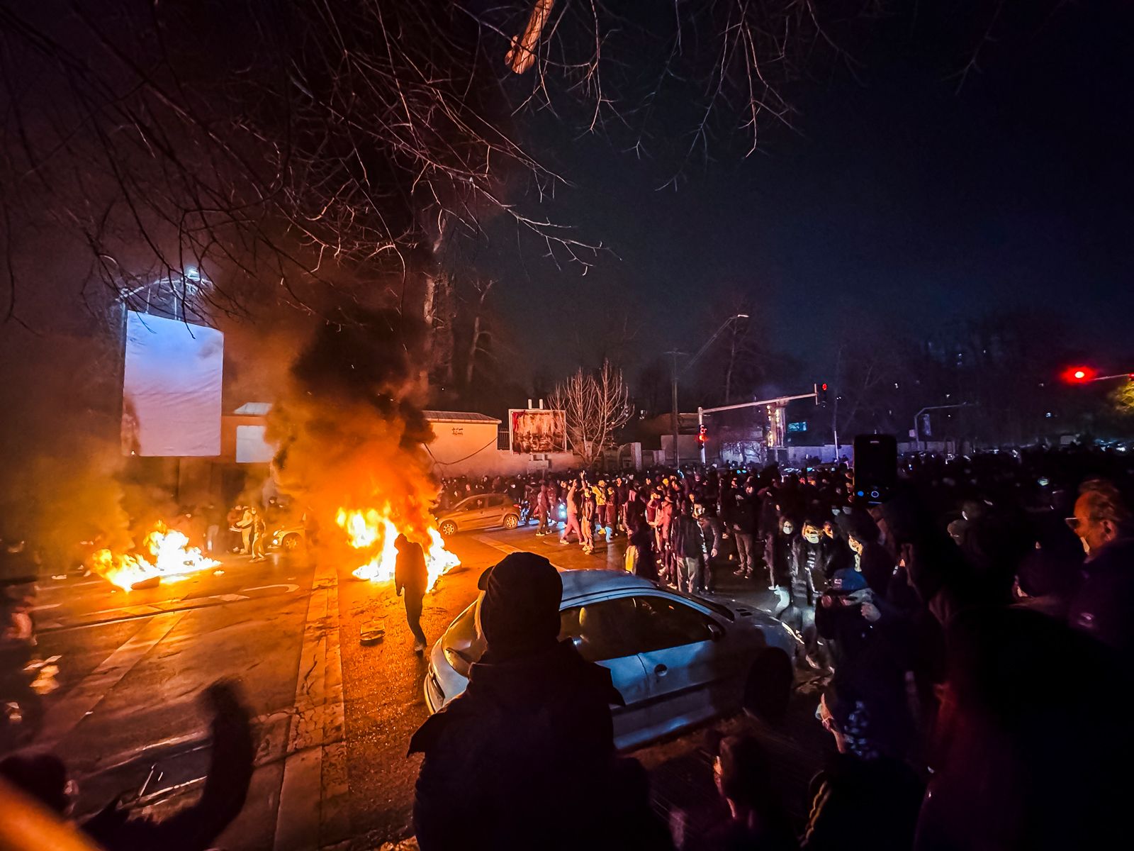 Night-time fires in an Iranian street during the January 2026 protests