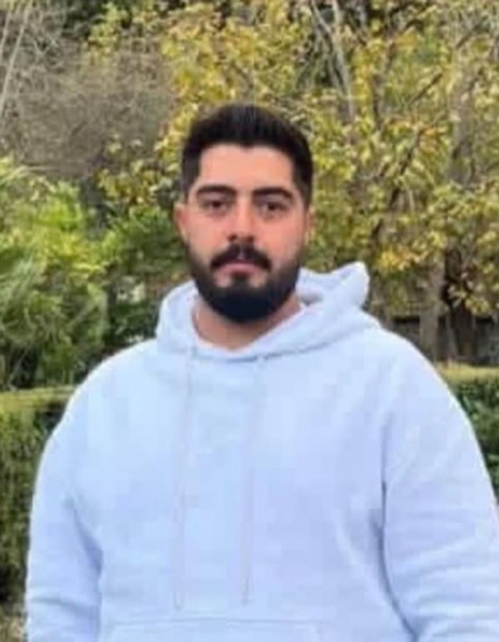 Portrait of Ahmad Hashemi, aged 22, from Mahallat, killed on January 8, 2026.