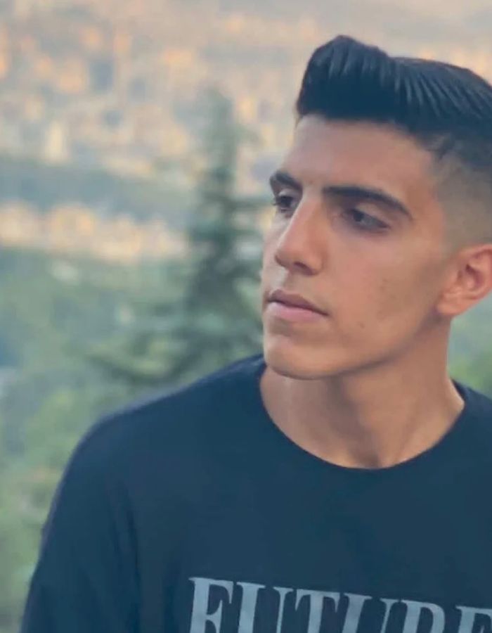 Portrait of Ali Mashhadi, aged 18, from Tehran, killed on January 8, 2026.