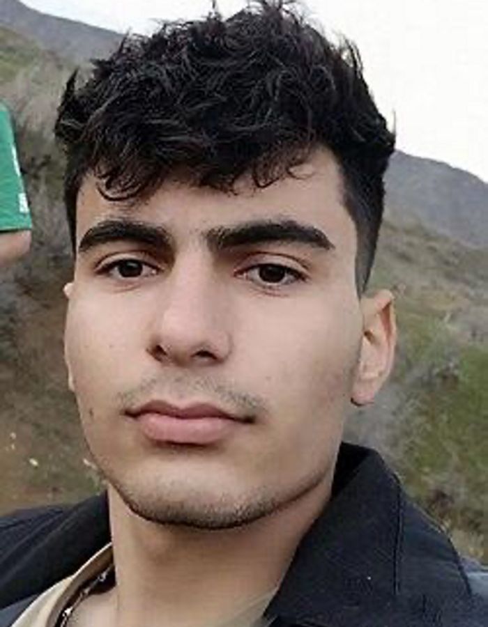 Portrait of Amirhesam Khodayarifard, aged 22, from Kuhdasht, killed on December 31, 2025.