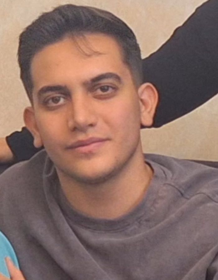 Portrait of Mehrshad Shafaei, aged 21, from Saveh, killed on January 8, 2026.