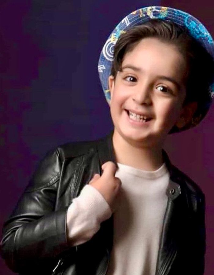 Portrait of Roham Barjasteh, aged 11, from Neyshabur, killed on January 8, 2026.