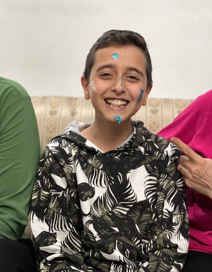 Portrait of Taha Hoshyar, aged 12, from Tehran, killed on January 8, 2026.